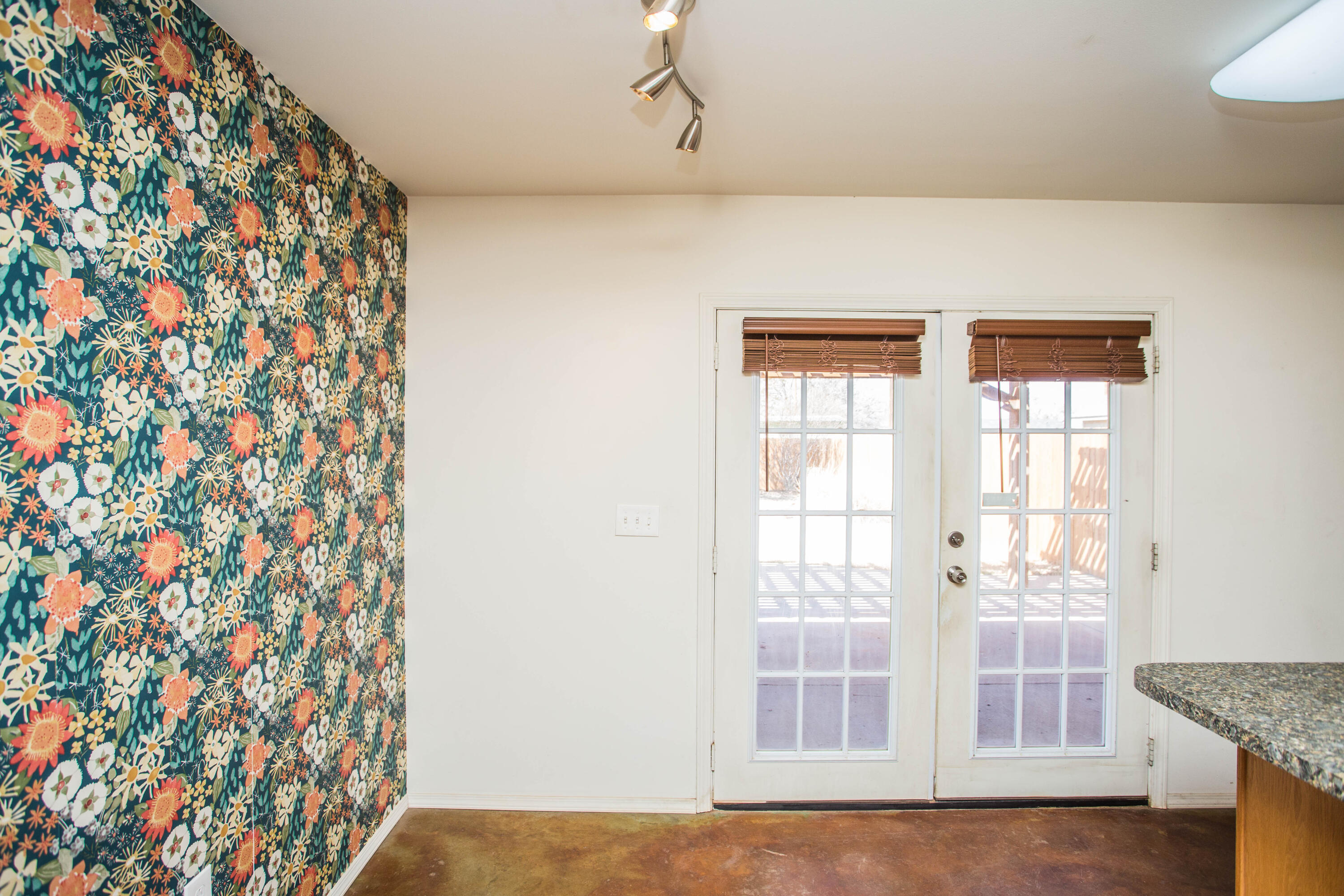 6114 22nd Street, Unit 2 Lubbock, TX 79407 - Photo 17 of 48 a view of a livingroom with wooden floor and a window