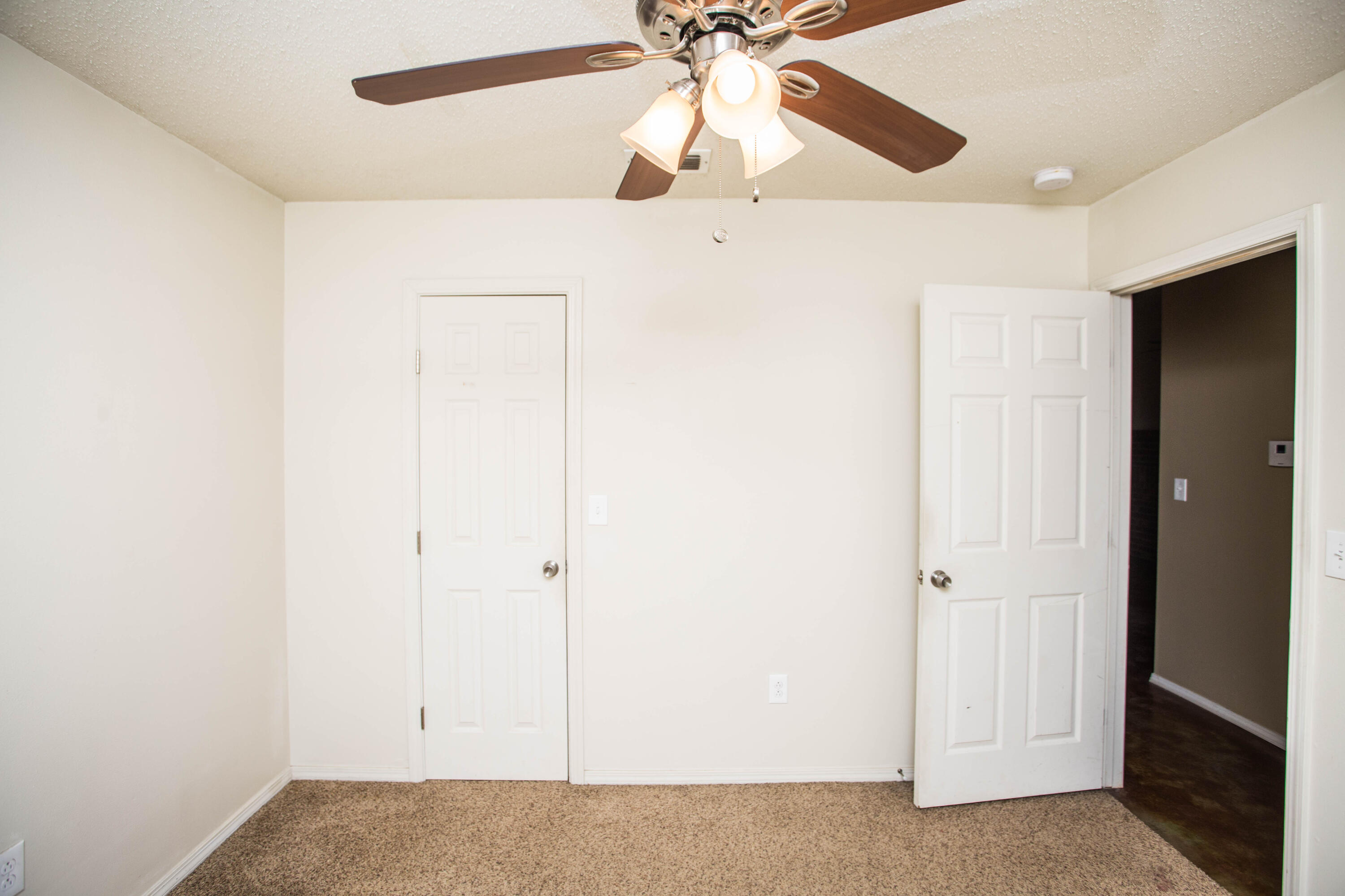 6114 22nd Street, Unit 2 Lubbock, TX 79407 - Photo 19 of 48 a view of an empty room
