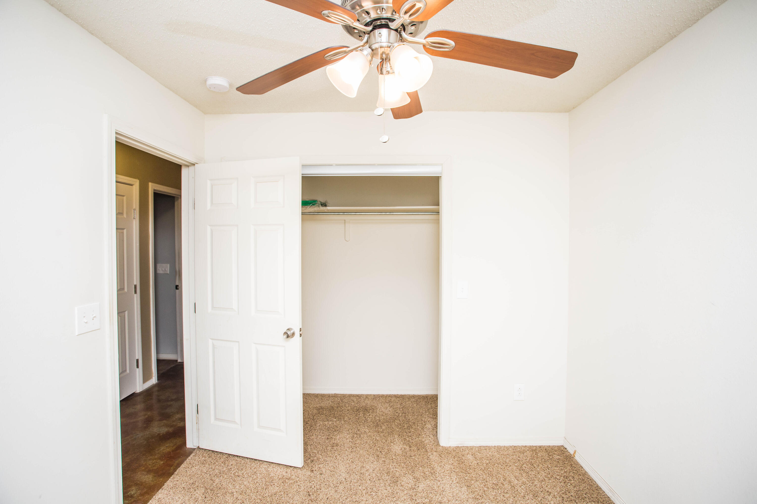 6114 22nd Street, Unit 2 Lubbock, TX 79407 - Photo 24 of 48 a very nice looking hallway with a window