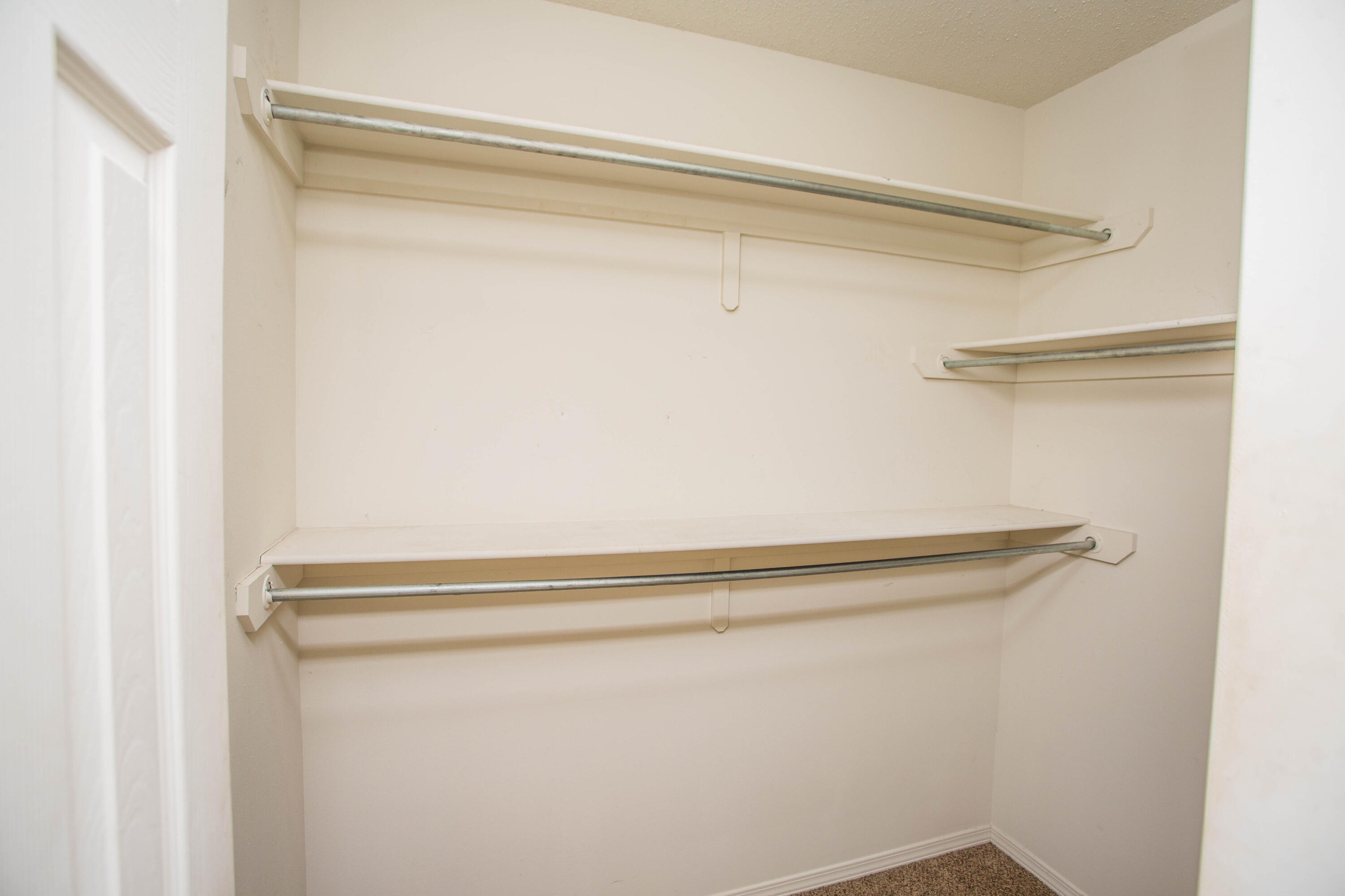 6114 22nd Street, Unit 2 Lubbock, TX 79407 - Photo 32 of 48 a close up view of racks on the wall