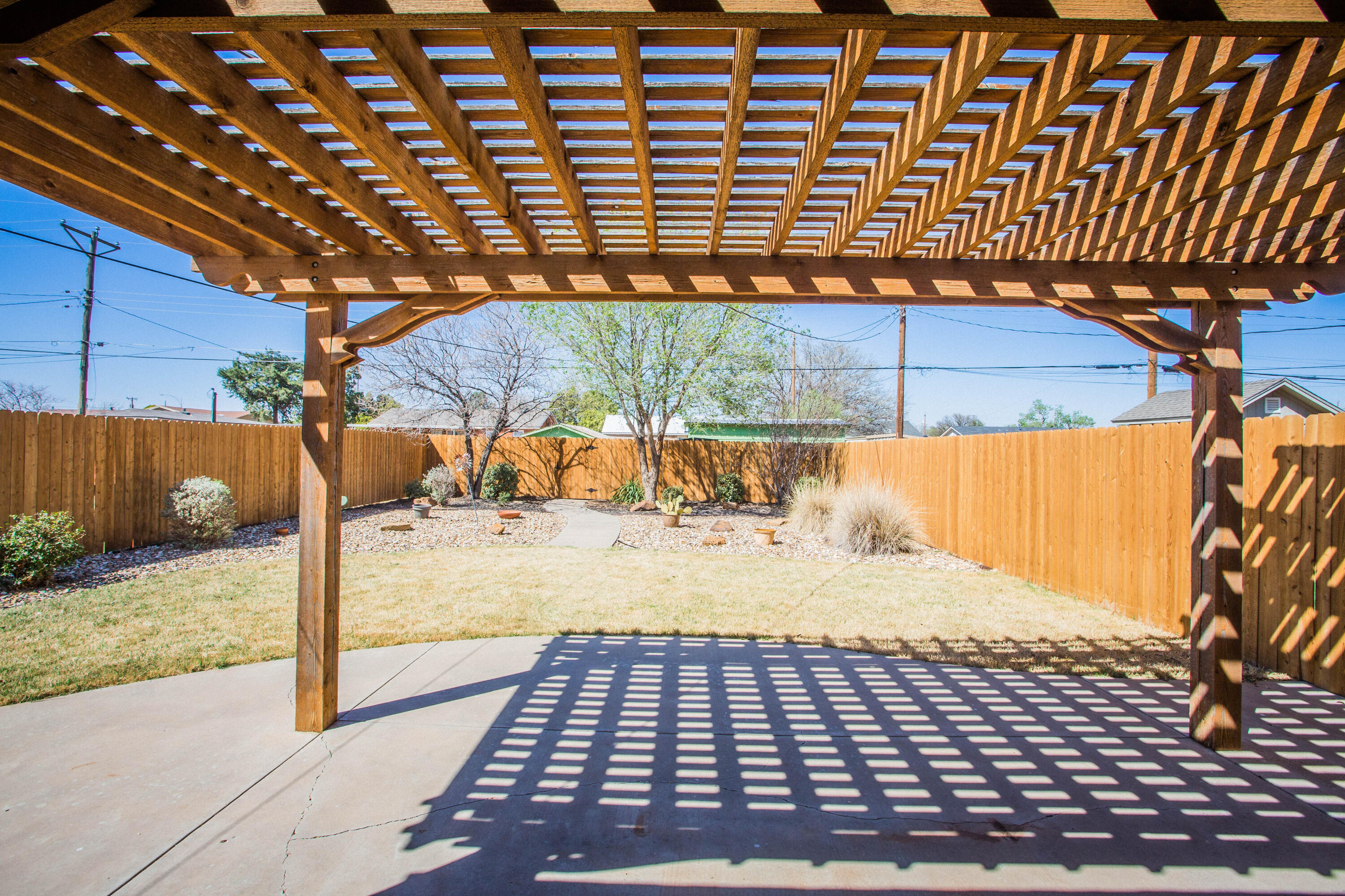 6114 22nd Street, Unit 2 Lubbock, TX 79407 - Photo 39 of 48 a view of a backyard