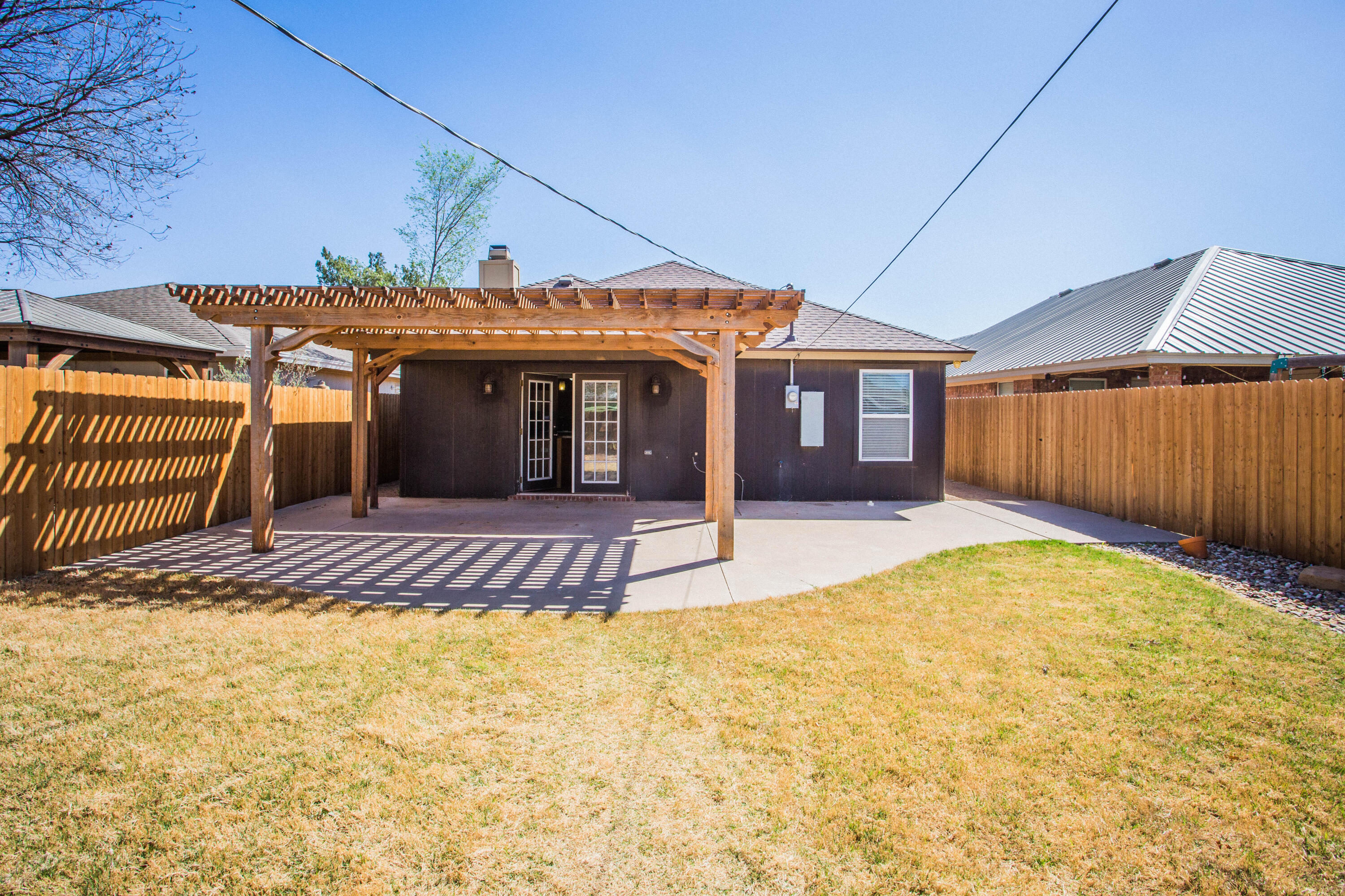 6114 22nd Street, Unit 2 Lubbock, TX 79407 - Photo 44 of 48 a view of a house with a outdoor space
