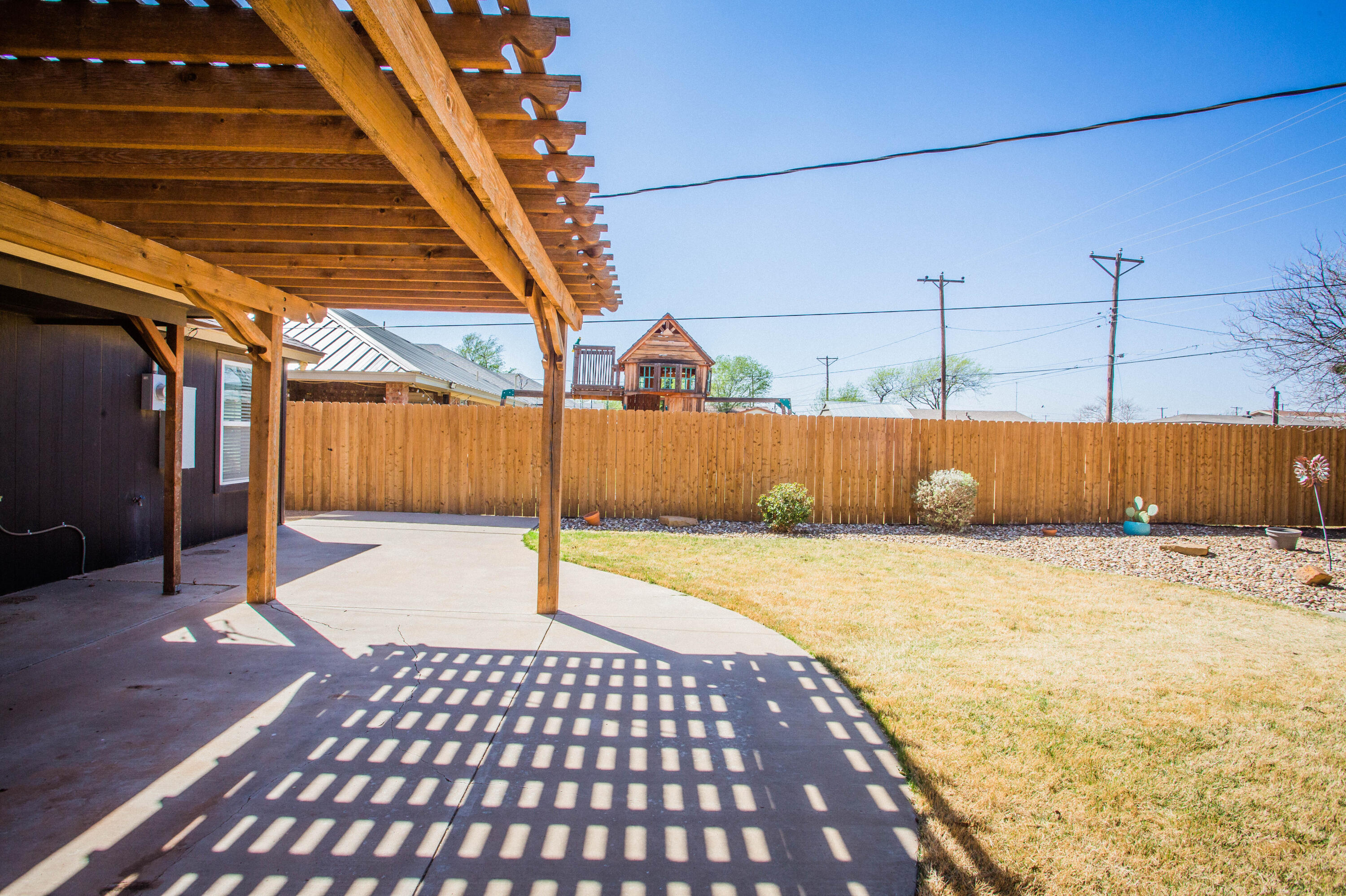 6114 22nd Street, Unit 2 Lubbock, TX 79407 - Photo 47 of 48 a view of a backyard