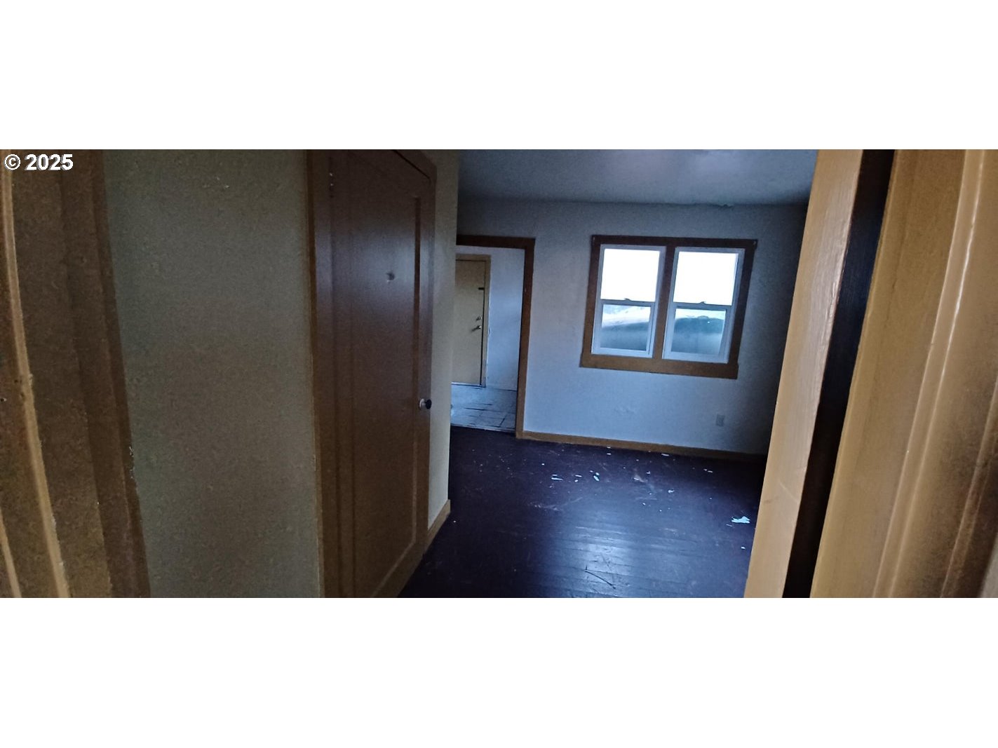 252 5th Street Glendale, OR 97442 - Photo 13 of 13 a view of an empty room with wooden floor and a window