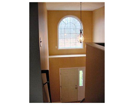 Entry/Foyer. View from the Second Floor Gathering Room onto the 2 Story Foyer.