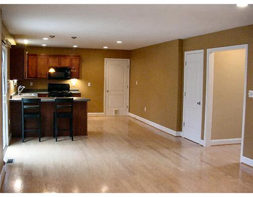 390 Longs Road Latrobe, PA 15650 - Photo 9 of 11 Interior Space/Layout. View from Familyroom into Kitchen. Notice the Hallway to Partial Bath Front Door and Foyer are all Hardwood Flooring!!