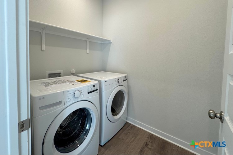 260 Escape Way Jarrell, TX 76537 - Photo 6 of 12 a utility room with dryer and washer