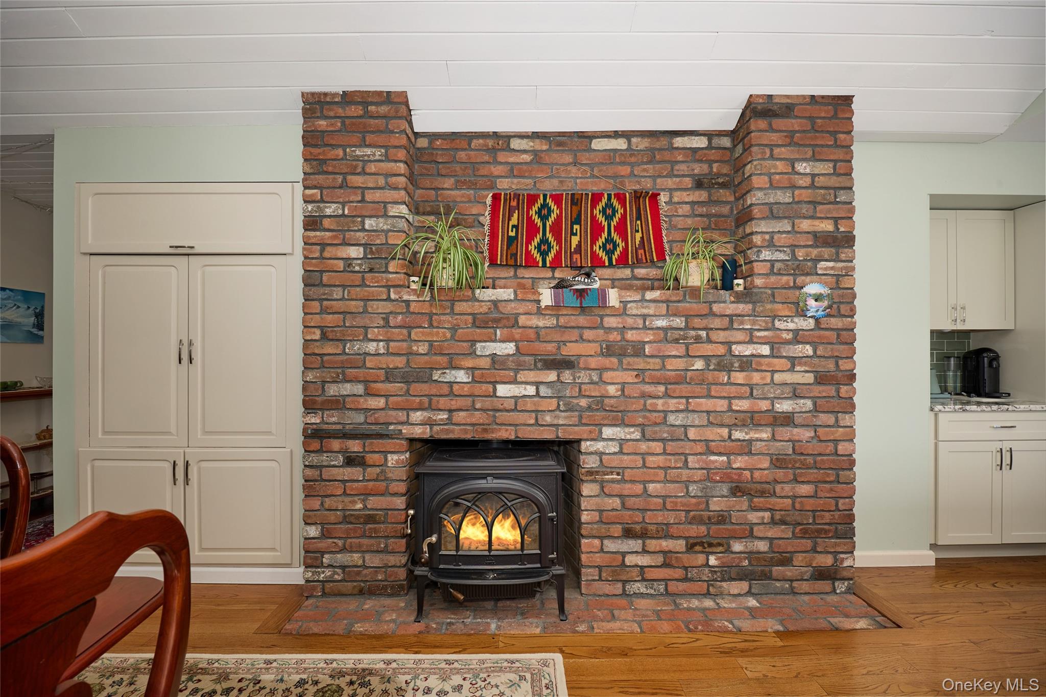 125 Smith Road Pleasant Valley, NY 12569 - Photo 13 of 45 Wood Burning Fireplace between Dining Room and Kitchen