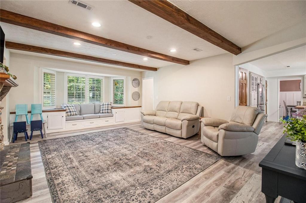 160 Old Field Road Sharpsburg, GA 30277 - Photo 19 of 58 a living room with furniture and a large window
