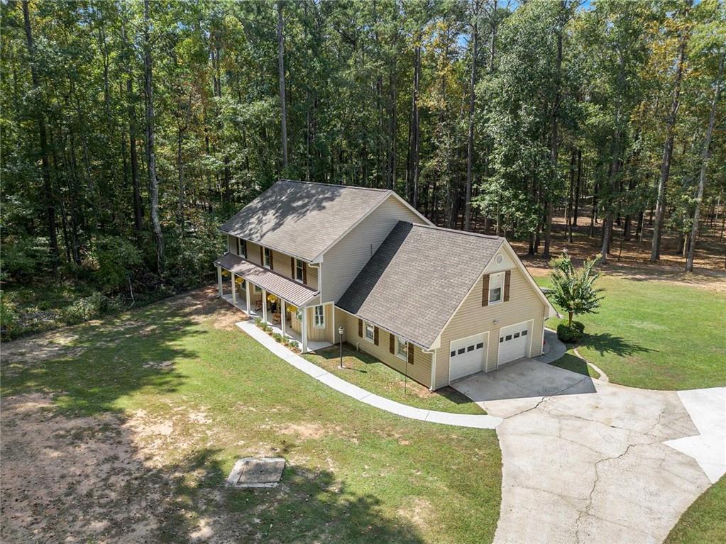 160 Old Field Road Sharpsburg, GA 30277 - Photo 3 of 58 a view of a house with a yard and sitting area
