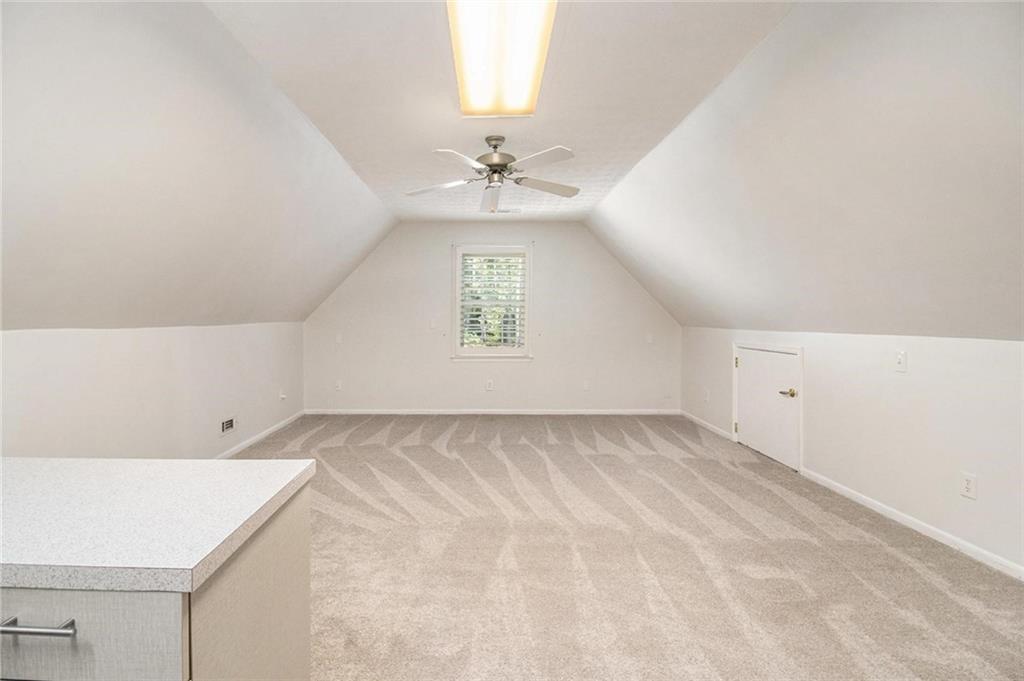 160 Old Field Road Sharpsburg, GA 30277 - Photo 31 of 58 wooden floor in an empty room with a window