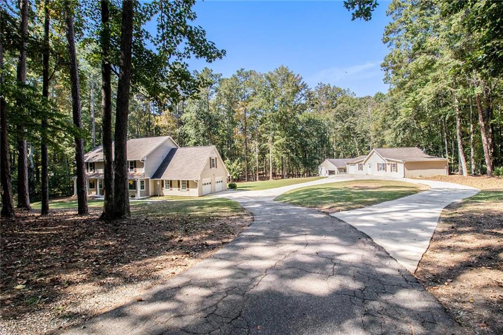 160 Old Field Road Sharpsburg, GA 30277 - Photo 42 of 58 a view of a outdoor space with trees