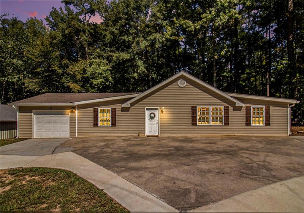 160 Old Field Road Sharpsburg, GA 30277 - Photo 43 of 58 a view of a house and a yard