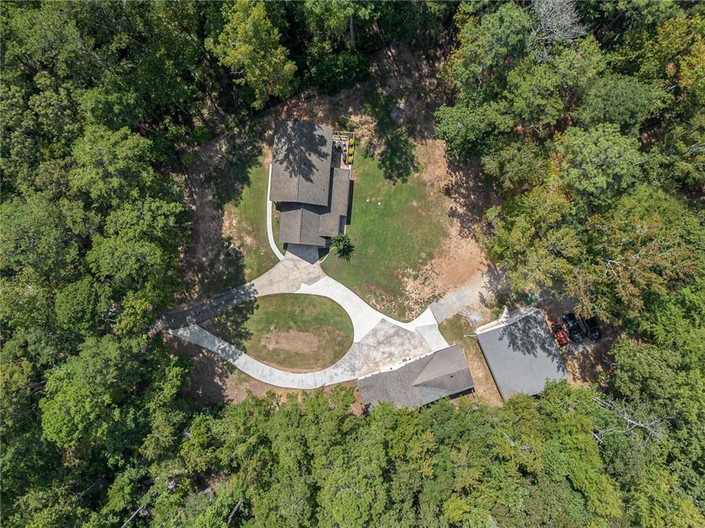 160 Old Field Road Sharpsburg, GA 30277 - Photo 54 of 58 a backyard of a house with yard and outdoor seating
