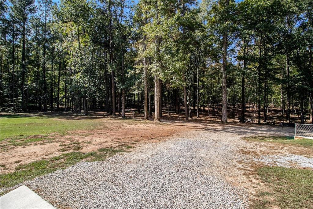 160 Old Field Road Sharpsburg, GA 30277 - Photo 58 of 58 a view of swimming pool with large trees