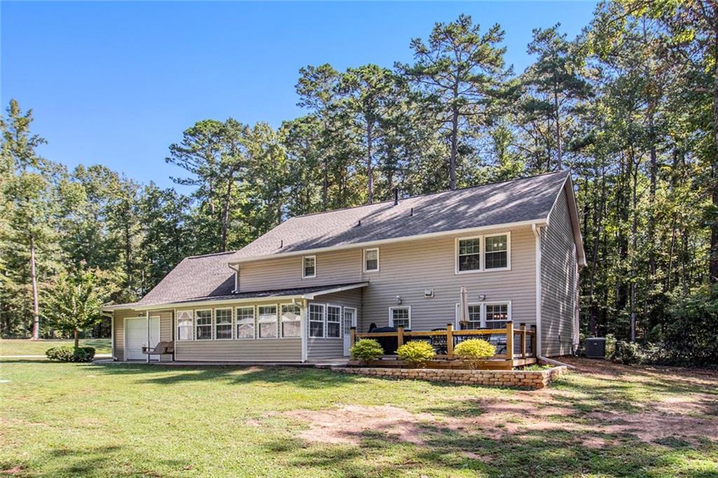 160 Old Field Road Sharpsburg, GA 30277 - Photo 9 of 58 a view of a house with swimming pool and sitting area