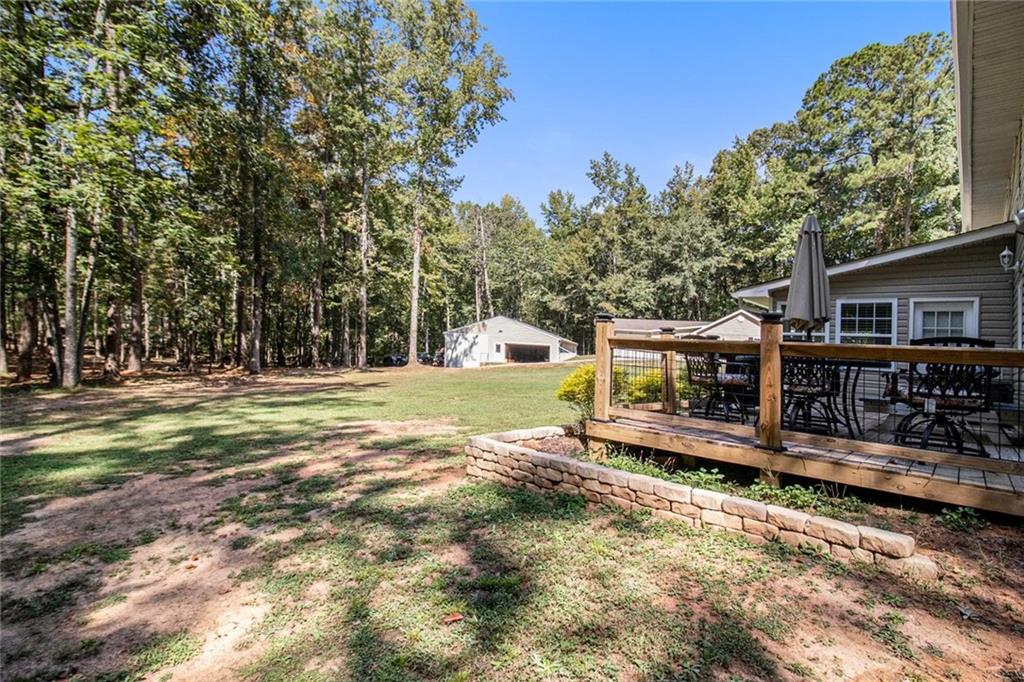160 Old Field Road Sharpsburg, GA 30277 - Photo 10 of 58 front view of a house with a yard
