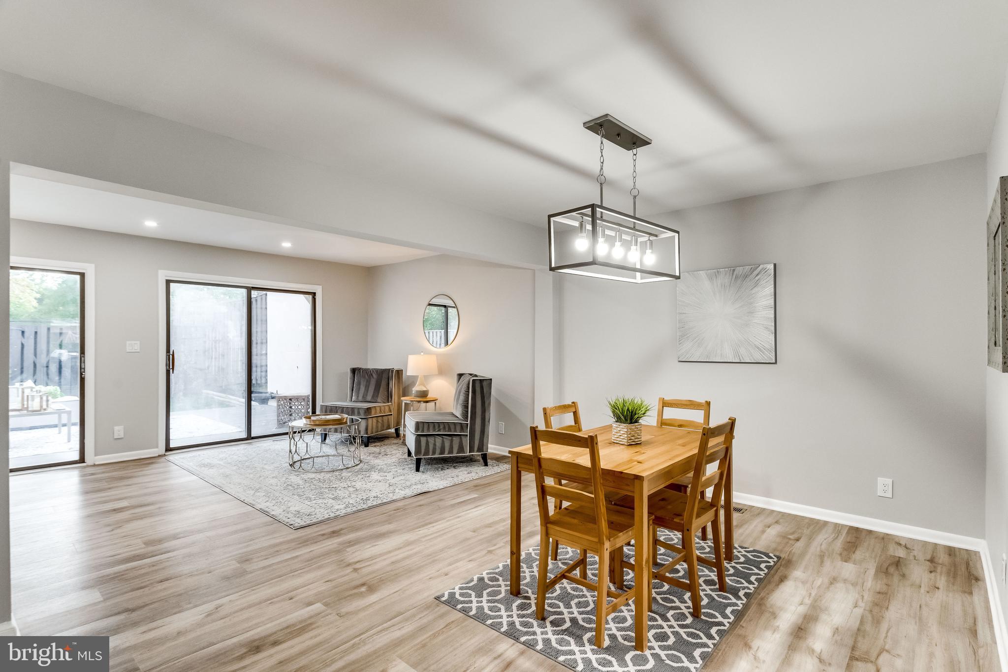 1666 Valencia Way Reston, VA 20190 - Photo 14 of 57 Open living space with front to back views