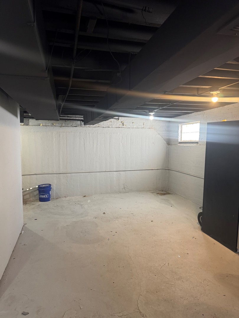 654 East 105th Street Chicago, IL 60628 - Photo 12 of 12 a view of a room with an empty space