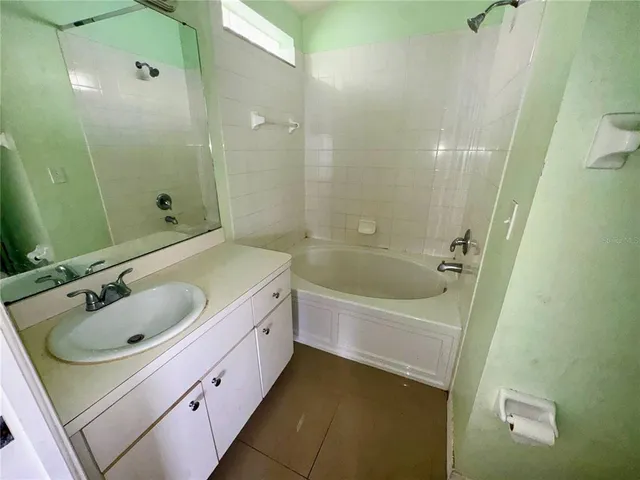 a bathroom with a sink and a bathtub