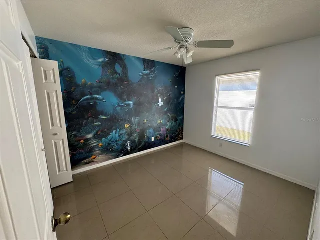 a view of a hallway with a window