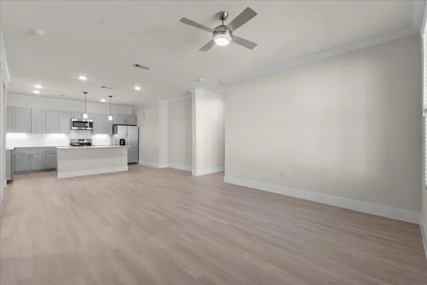 a bathroom with double vanity sinks and a mirror