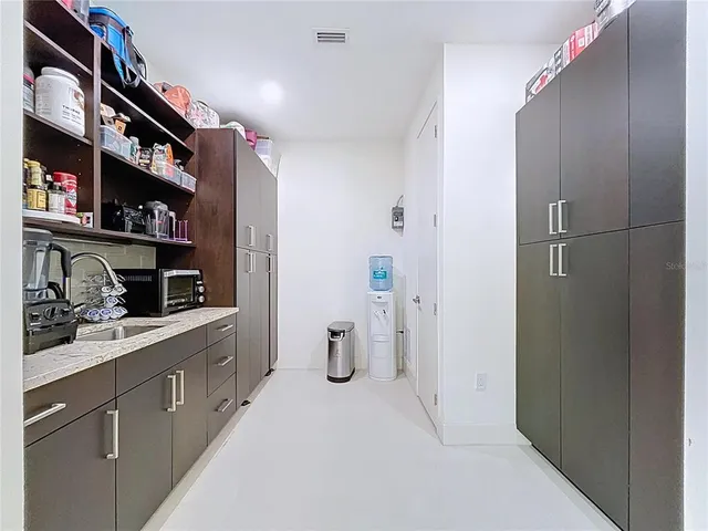 a spacious bathroom with a tub and sink