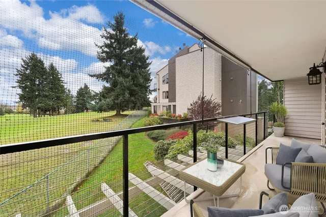 a view of balcony with furniture