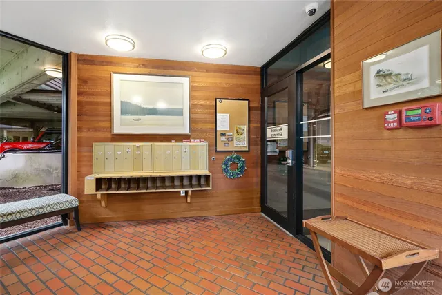 a view of a livingroom with furniture and windows