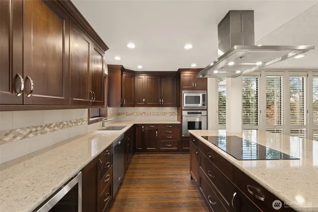 a large kitchen with a large counter top