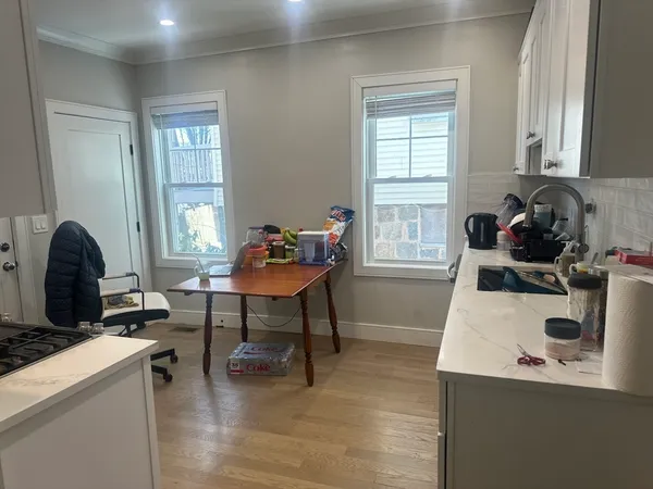 a workspace with furniture and window