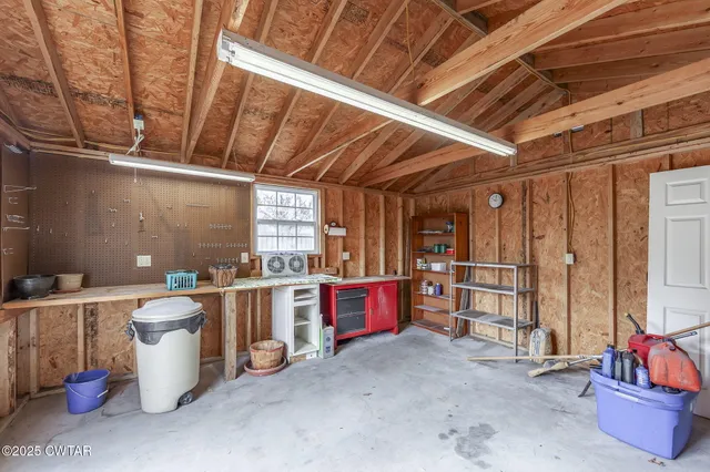 a room with lots of appliances and a window