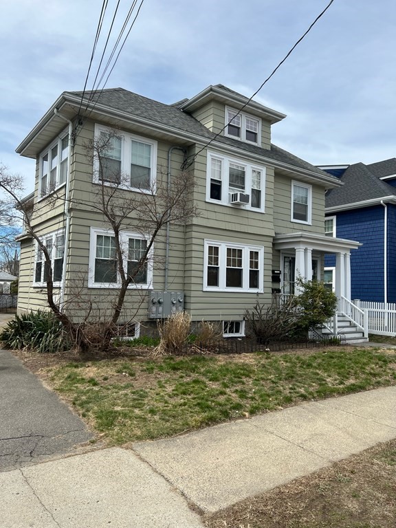 204 Eastern Avenue Lynn, MA 01902 - Photo 16 of 16 a front view of a house with a yard