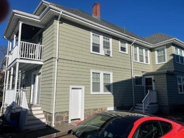 204 Eastern Avenue Lynn, MA 01902 - Photo 3 of 16 a front view of a house with parking space