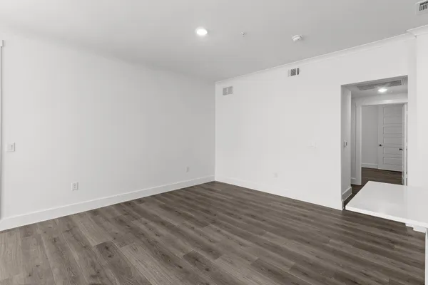 a view of kitchen with wooden floor