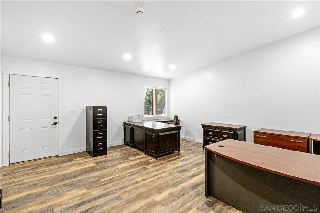 5461 Rainbow Creek Road Fallbrook, CA 92028 - Photo 23 of 28 a room with a bed and a television