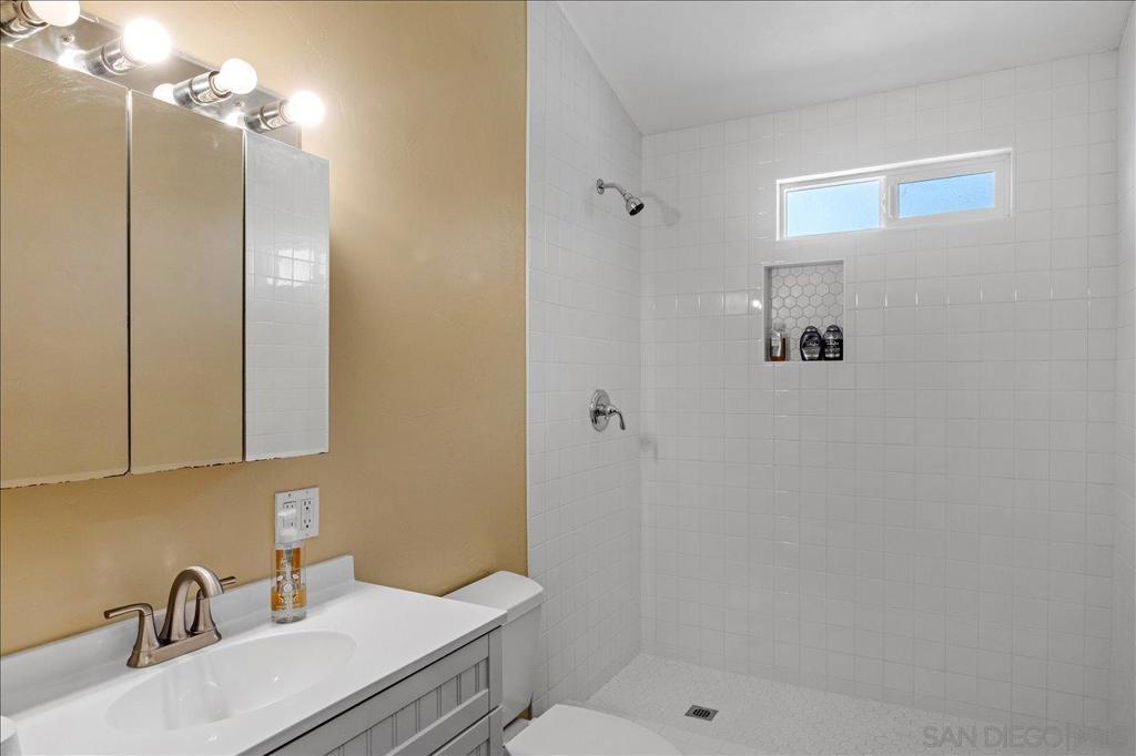 5461 Rainbow Creek Road Fallbrook, CA 92028 - Photo 27 of 28 a bathroom with a sink a toilet and shower