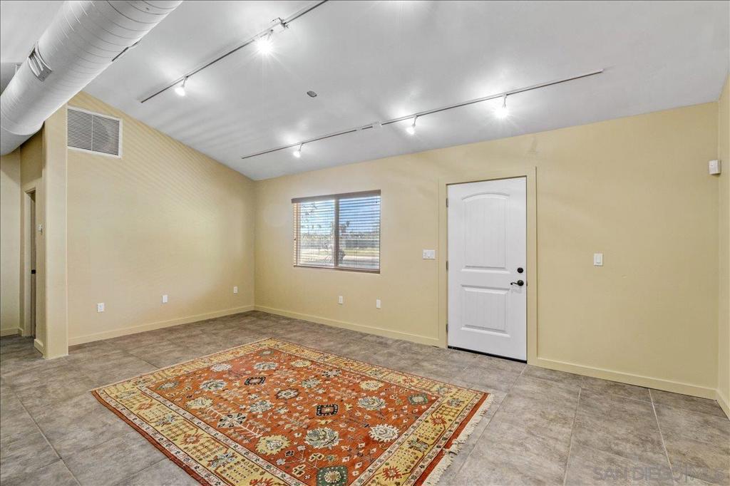 5461 Rainbow Creek Road Fallbrook, CA 92028 - Photo 9 of 28 a view of an empty room and window