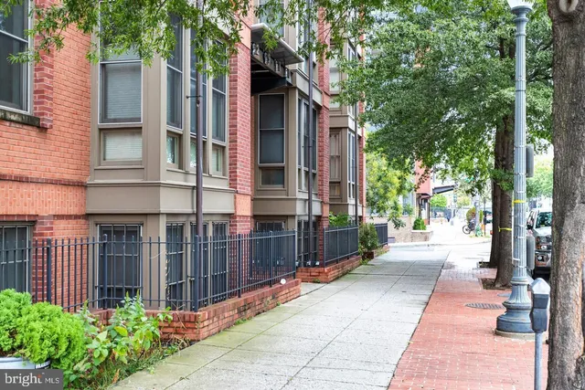 a view of a pathway with a house