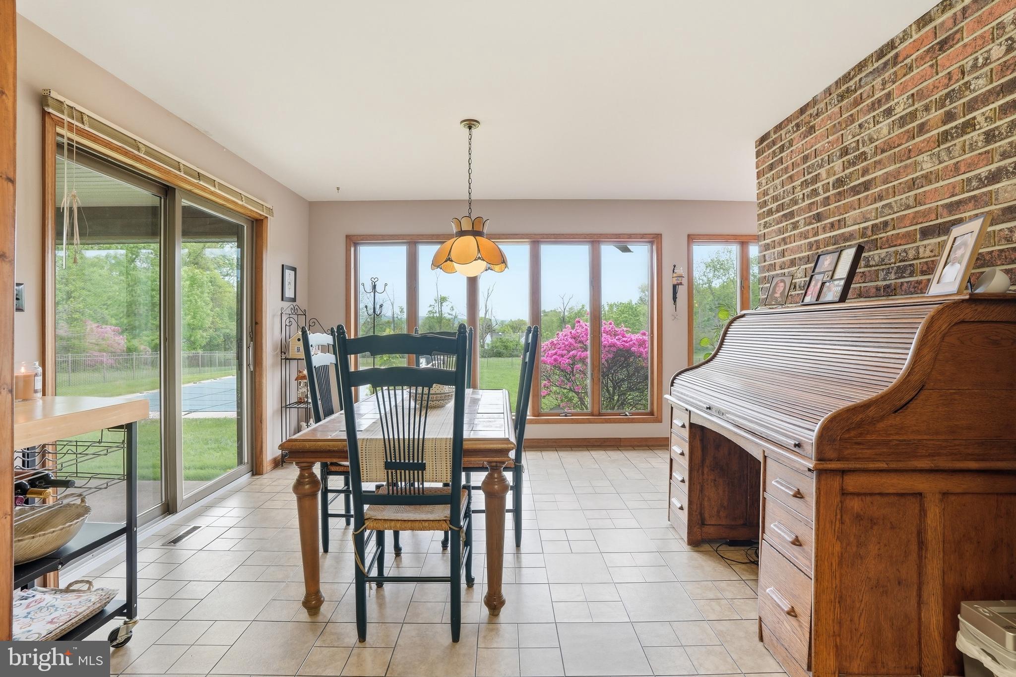 2045 Adams Road East Greenville, PA 18041 - Photo 17 of 62 Breakfast Room overlooking pool