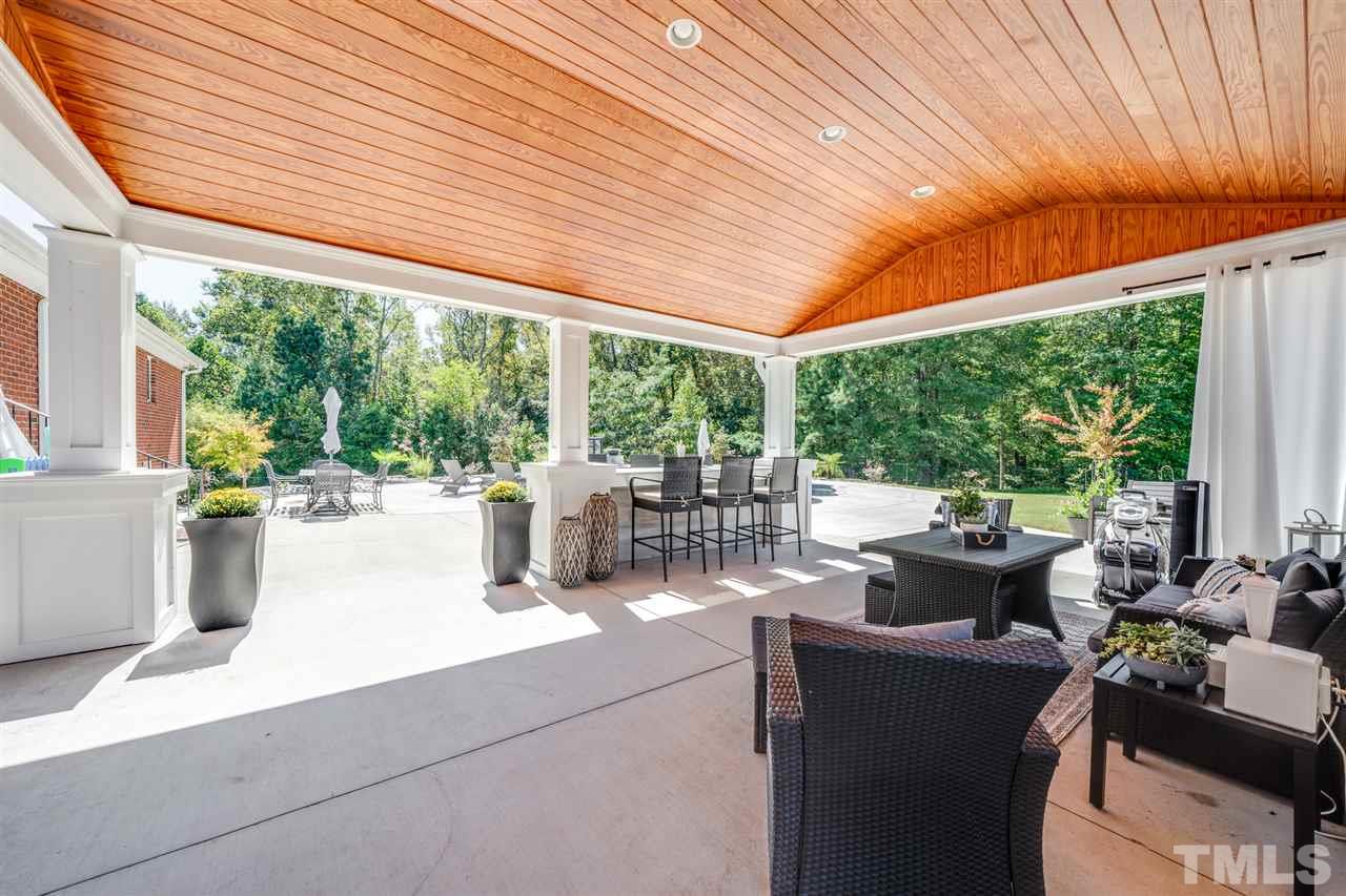 2256 Sanders Road Stem, NC 27581 - Photo 22 of 29 a view of a patio and garden