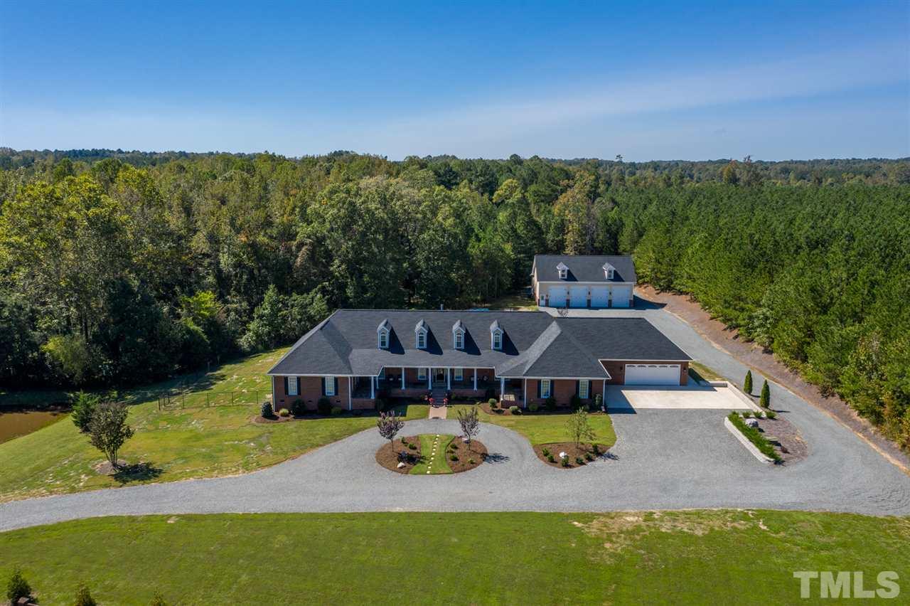 2256 Sanders Road Stem, NC 27581 - Photo 29 of 29 an aerial view of a house with balcony