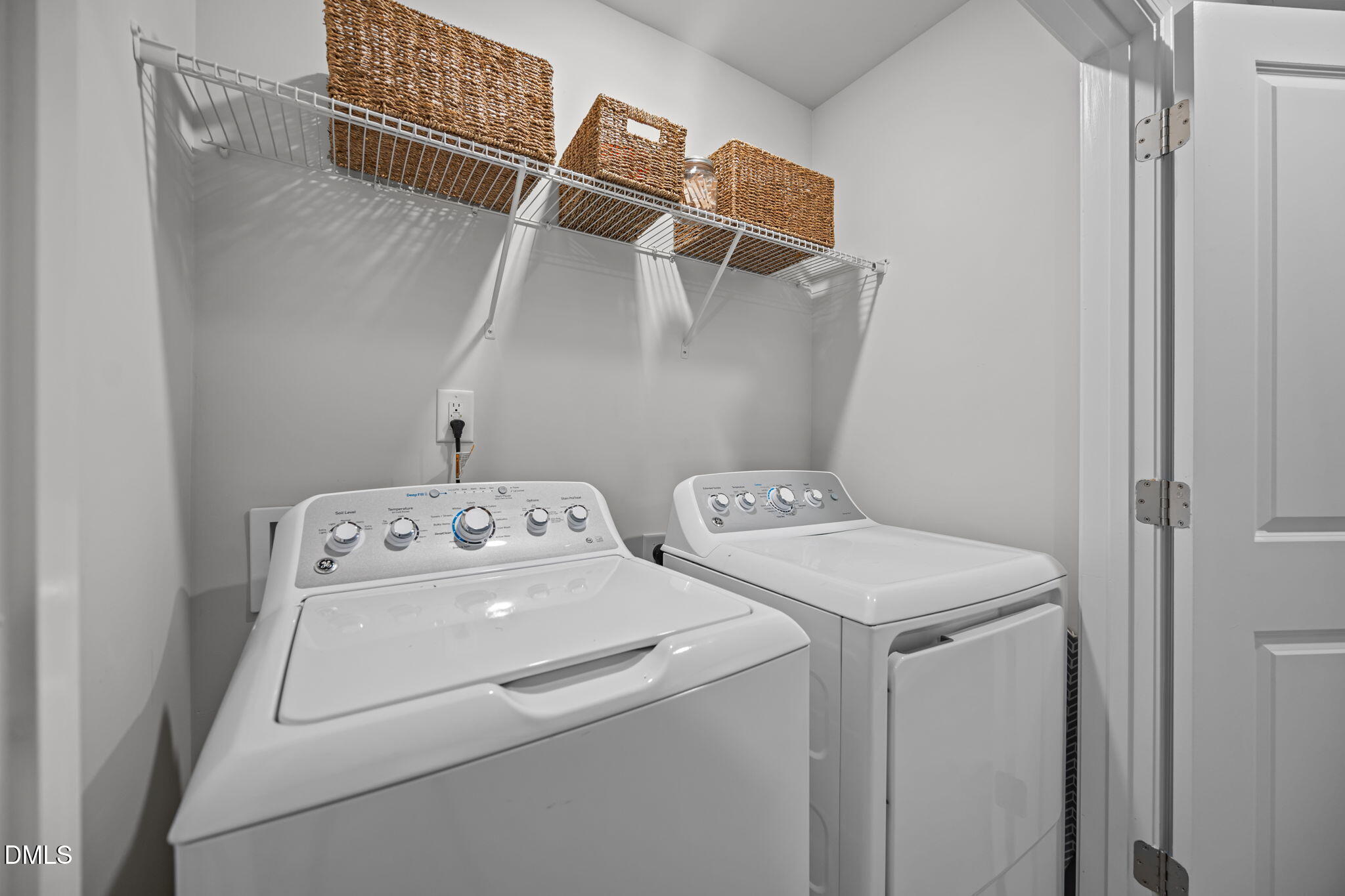 6414 Nurture Avenue Raleigh, NC 27616 - Photo 26 of 36 a utility room with dryer and washer