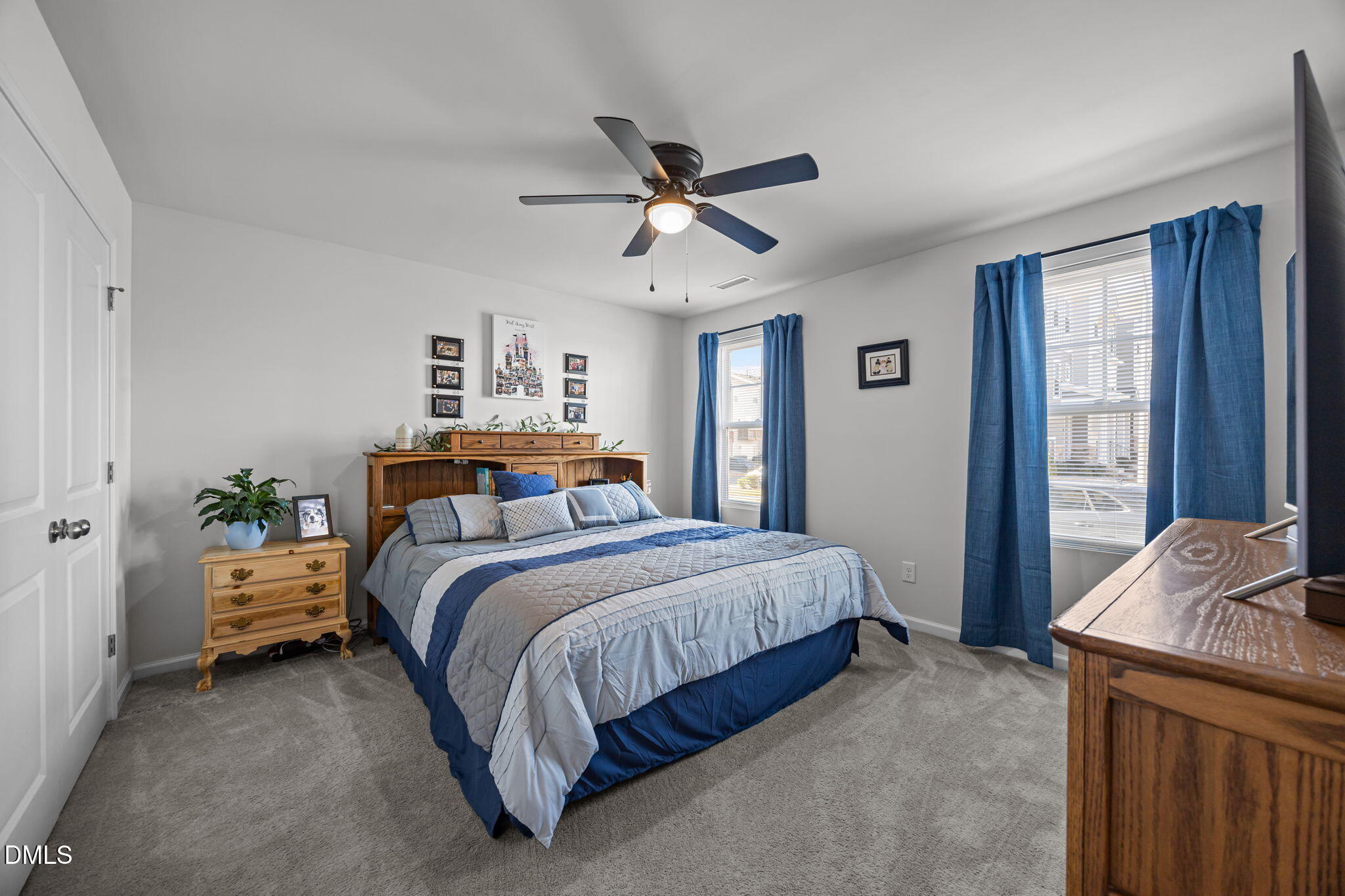 6414 Nurture Avenue Raleigh, NC 27616 - Photo 8 of 36 a bedroom with bed and window