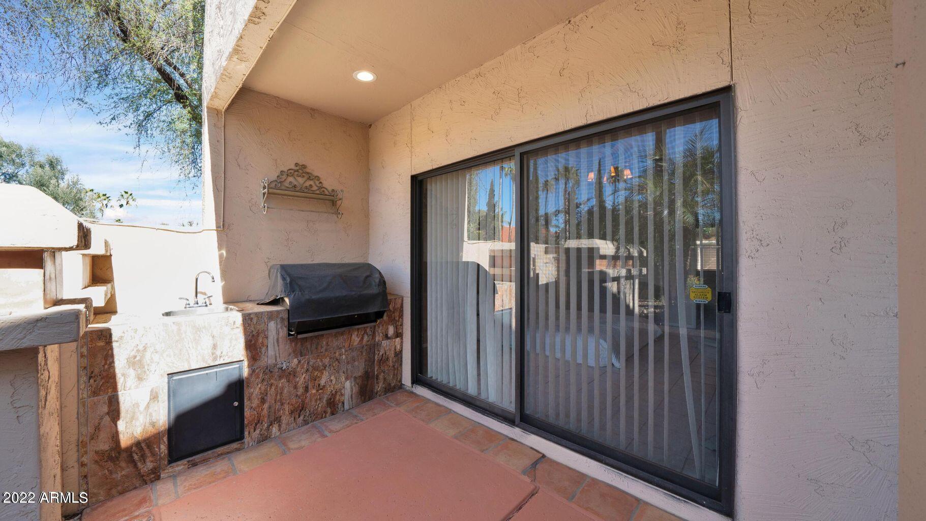 9709 East Mountain View Road, Unit 1624 Scottsdale, AZ 85258 - Photo 8 of 13 Patio with grill