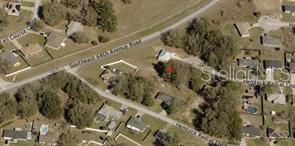 30 Hemlock Radial Court Ocala, FL 34472 - Photo 5 of 14 a picture of door with wooden floor