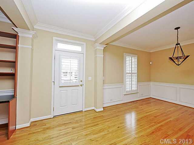 420 Third Baxter Street Fort Mill, SC 29708 - Photo 2 of 16 a view of an empty room with window and wooden floor