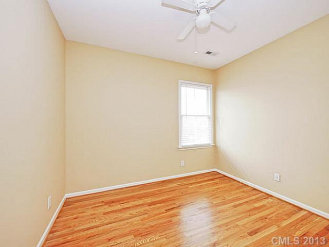 420 Third Baxter Street Fort Mill, SC 29708 - Photo 15 of 16 an empty room with a window and a ceiling fan