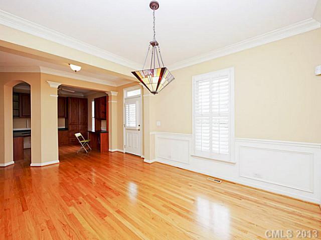 420 Third Baxter Street Fort Mill, SC 29708 - Photo 4 of 16 a view of empty room with wooden floor and fan