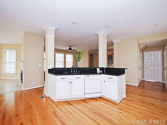 420 Third Baxter Street Fort Mill, SC 29708 - Photo 8 of 16 a view of large kitchen with granite countertop a sink and dishwasher a stove with wooden floor